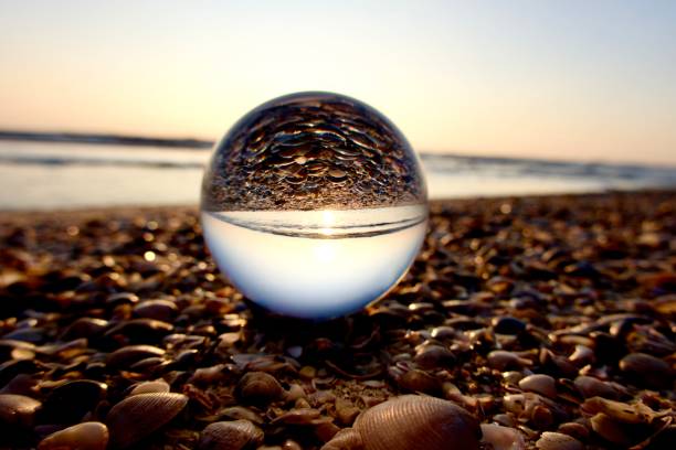 istock Crystal ball at sea during dawn 1761423281