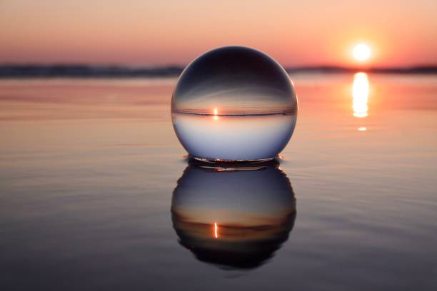 istock Crystal ball at sea during dawn 1761423805