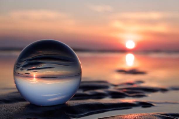 istock Crystal ball at sea during dawn 1761423810