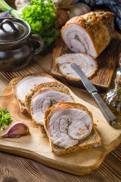 istock Tasty breakfast - dark bread with baked bacon. 1761424347