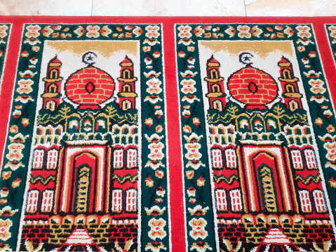 Muslim prayer rug with mosque pattern. Praying mats. Mosque flooring