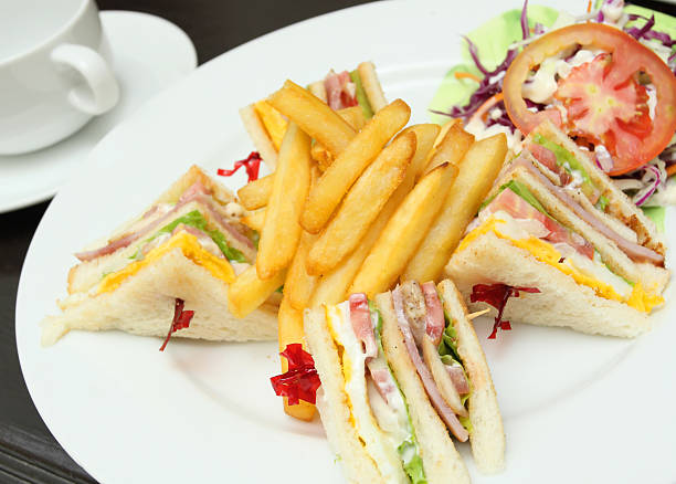 istock club sandwich with salad and potato 176143612