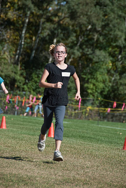istock Girl Running In Race 176144037