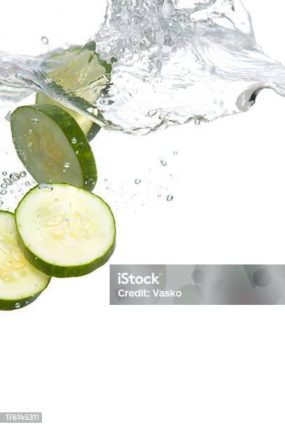 Cucumbers In Water Stock Photo - Download Image Now - Cucumber, Water, Slice of Food