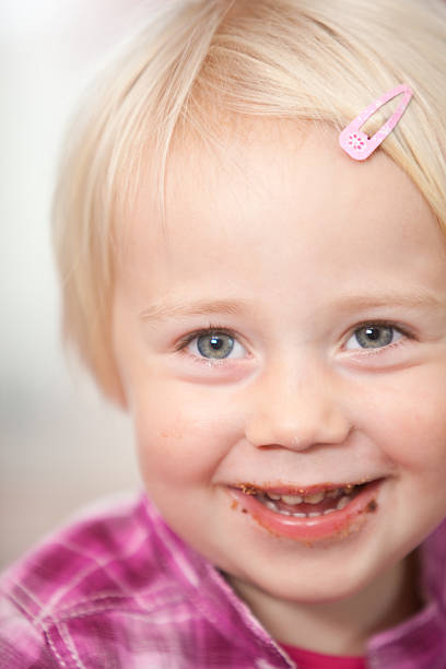 istock girl with dirty mouth 176147044