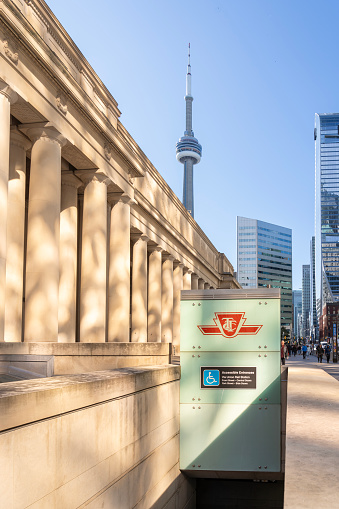 TTC (Toronto Transit Commission) logo is seen outside the Union Station building with the CN tower background in Toronto, ON, Canada, on October 22, 2023. TTC is the public transport agency.