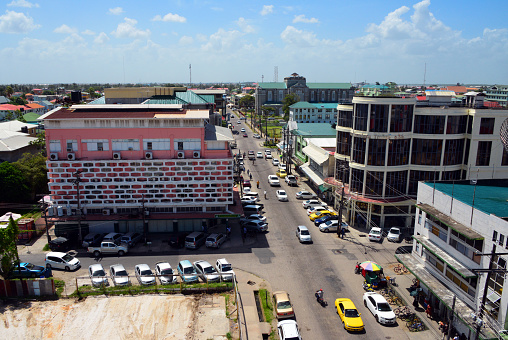 Georgetown, Guyana: city life of the Guyanese capital - view over Camp Street - Catholic Cathedral, commerce, offices and downtown traffic.