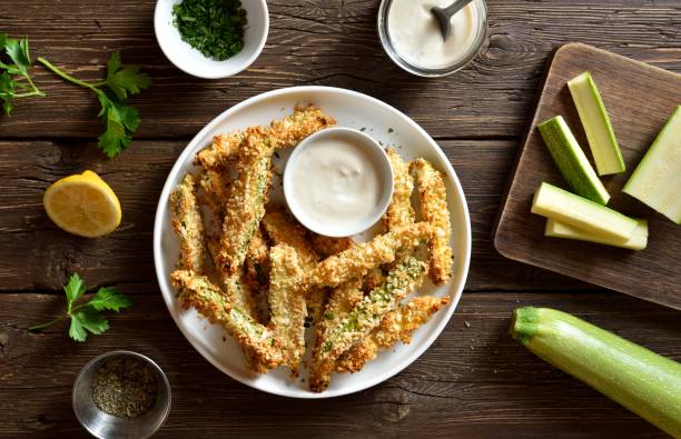 istock Crunchy zucchini breaded sticks with dip sauce 1761486801