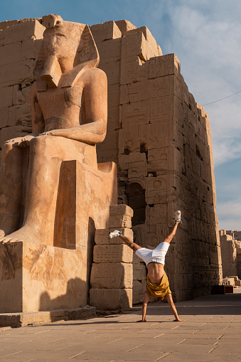 young man visits Karnak Temple