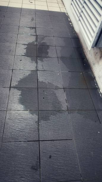 istock Wet floor with rain water inside a building 1761506763