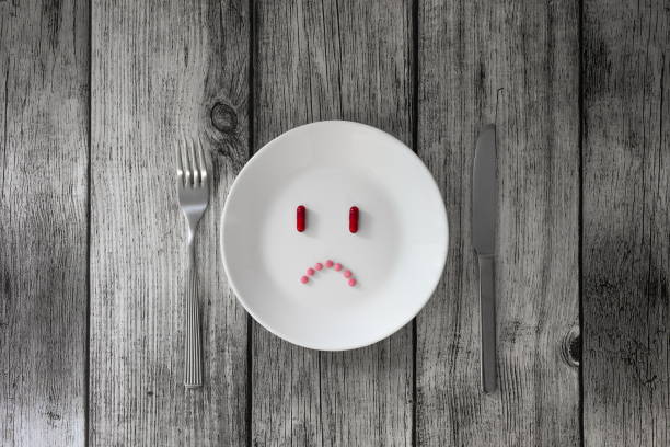 istock Drugs, depression, grey mood, medicine, pills for breakfast, loneliness, sadness 1761510607