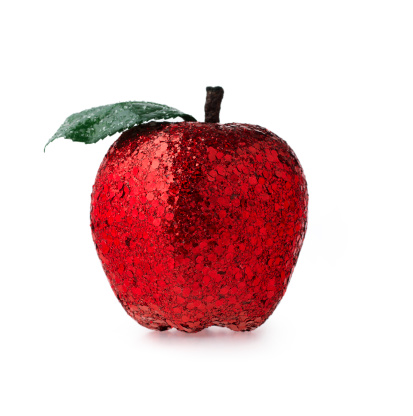 A sparkly red apple Christmas ornament shot on white.