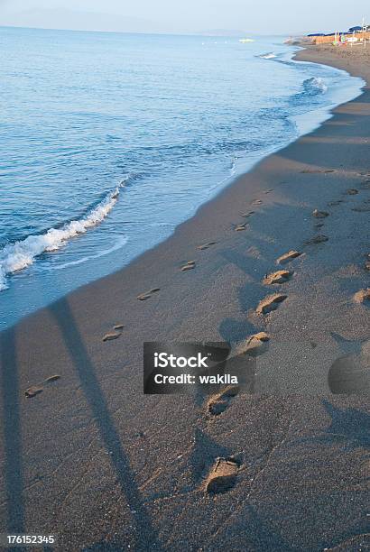 Footsteps At Beach In Morning Sun Stock Photo - Download Image Now - Backgrounds, Barefoot, Beach
