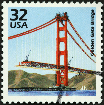 construction of the Golden Gate bridge on a postage stamp.