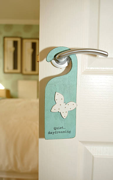 istock Bedroom door hanger that says,  Quiet ........ daydreaming ! 176154336