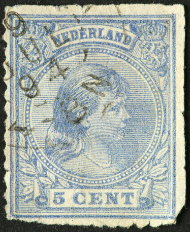 very old Netherlands stamp with young portrait of Queen Wilhelmina.