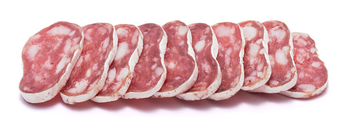 Spanish Fuet thin dried salami sausage isolated on a white background.