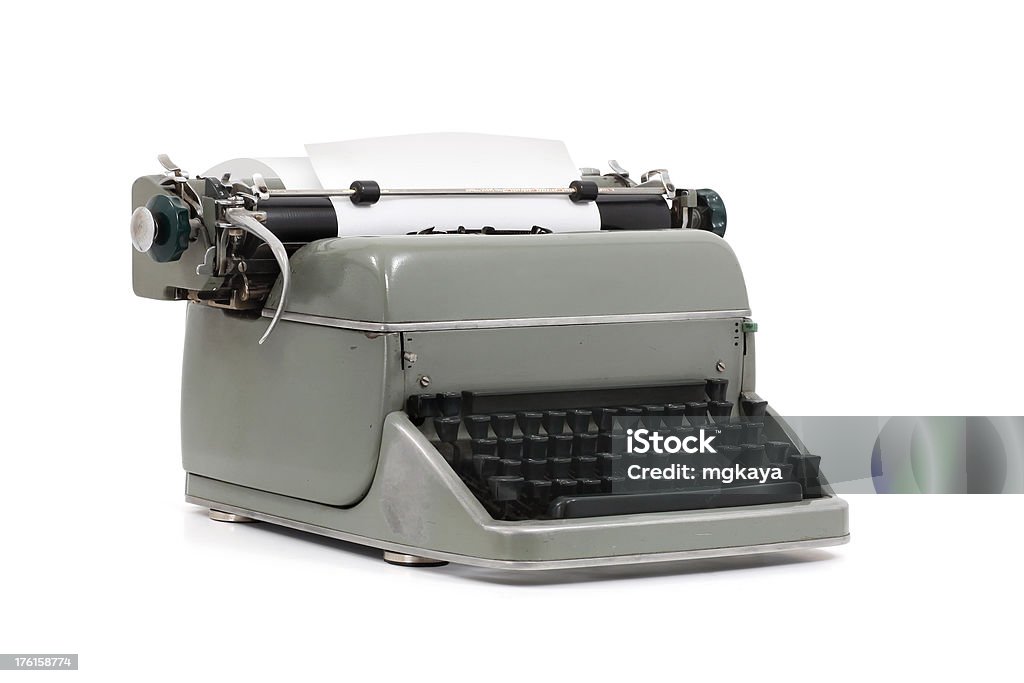 Typewriter "A vintage typewriter, isolated on white background." Typewriter Stock Photo