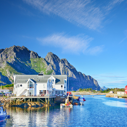 Henningsvær is a fishing village located on Lofoten islands, Norway. Composite photo