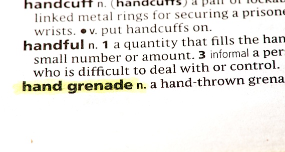 close up photo of the word hand grenade
