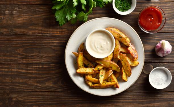 istock Potato wedges with sauce 1761635994