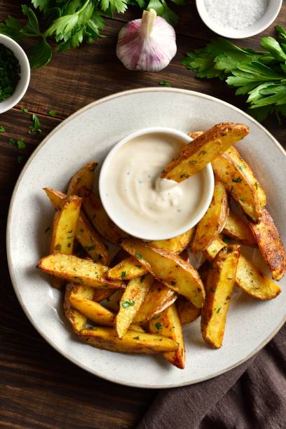istock Potato wedges with dipping sauce 1761636122