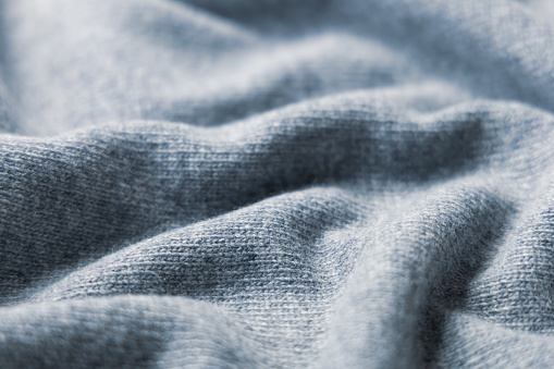 Textile background soft cashmere texture. Wool products.