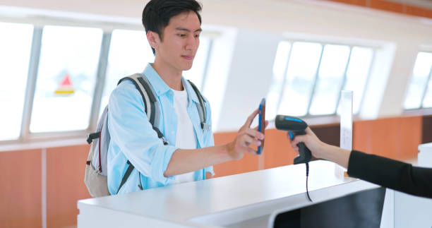 istock Female celluar checkin desk airport 1761643064