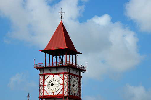 Traditional clock in St George's tower in Canterbury, Kent, England.