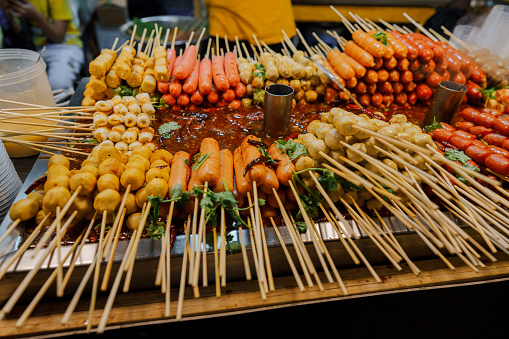 Skewers for sale on night market in Bangkok, Thailand