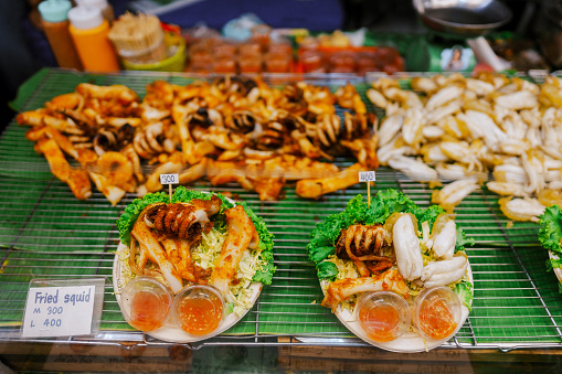 Close up of grilled squid for sale on night market