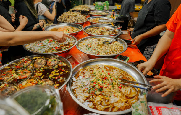 Marinated shrimps and seafood  on night market in Bangkok