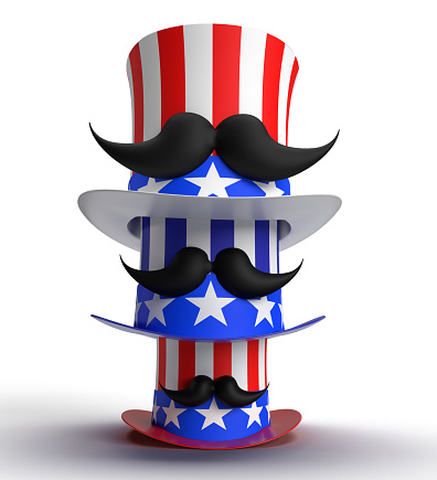 Patriotic American hat textured with American flag surrounded by star shaped confetti sitting on wood surface in front of defocused  background.  Vote written envelope entering the hat. Horizontal composition with copy space. Front view. 2020 Presidential Election concept.