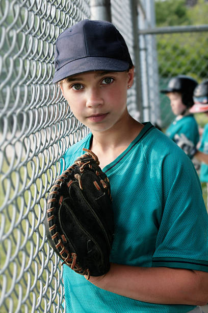 istock Girl in Baseball Dugout during Game 176165166
