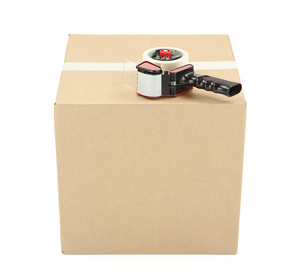 istock Cardboard Box and Tape Gun 176165444