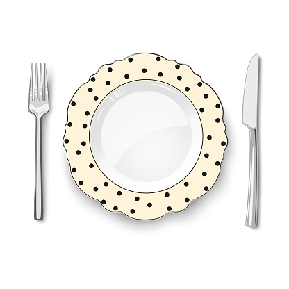 Empty vector ivory dish with figured edges and black polka dot pattern on white background and knife and fork isolated. Close up view from above.