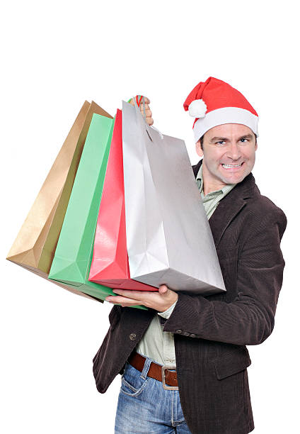 feliz navidad compras - male1 fotografías e imágenes de stock