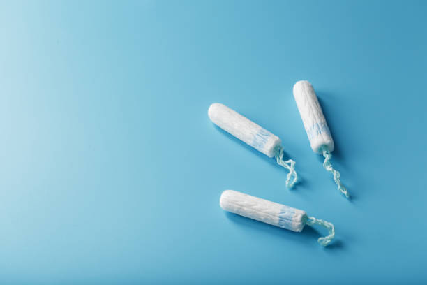 istock Gynecological tampons on a blue background free space 1761668903
