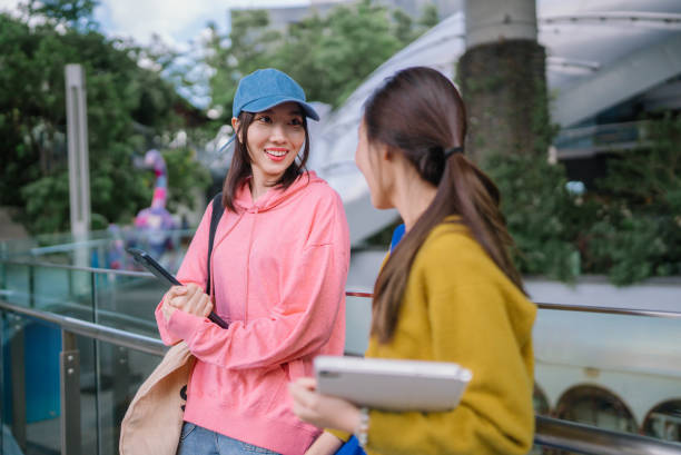 istock Group of Young Asian student walking and talking at university before class room. education, back to school 1761675012