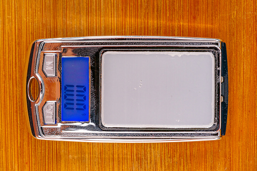 small precision weighing device on the hundredth scale with digital display at 0.00g
