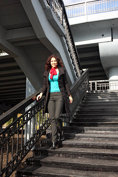 istock woman on staircase 176168013