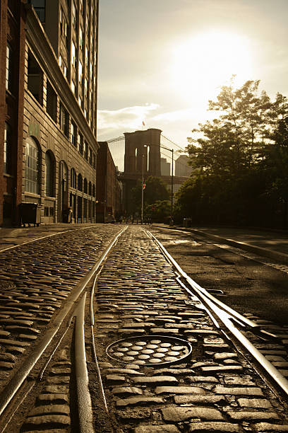 istock Deserted Brooklyn Bridge Waterfront Street Sunset 176168344