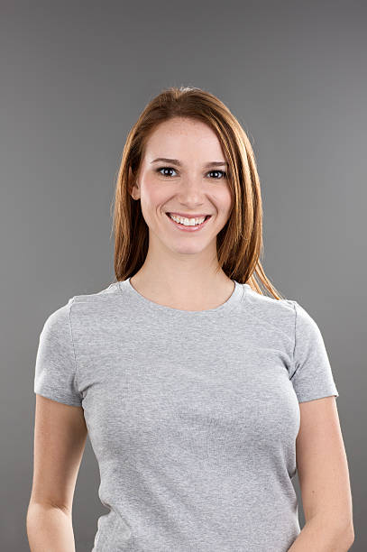 istock Young woman with blank gray shirt 176168521