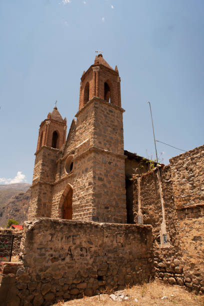 istock Old adobe church in an abandoned house, background texture image.Historic abandoned adobe wall cracked,dirty in ruins in a hacienda house in Yaca Peru 1761686571