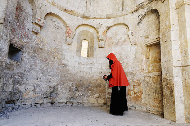 istock Woman with sword in medieval alcove 176168802