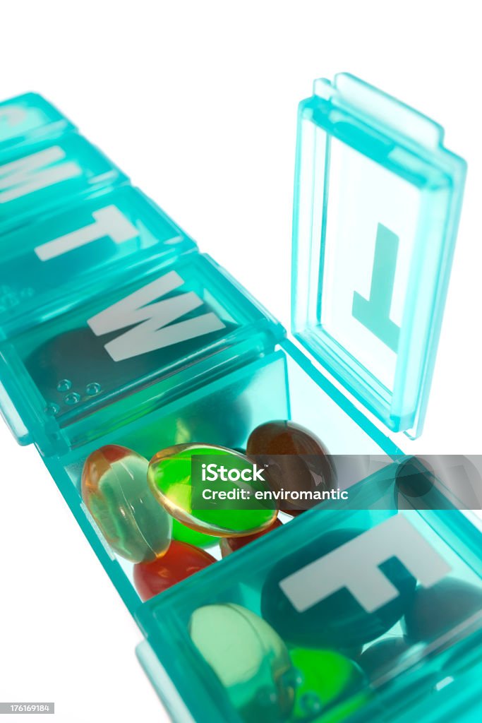 Las cápsulas y los comprimidos de un medicamento. - Foto de stock de Asistencia sanitaria y medicina libre de derechos