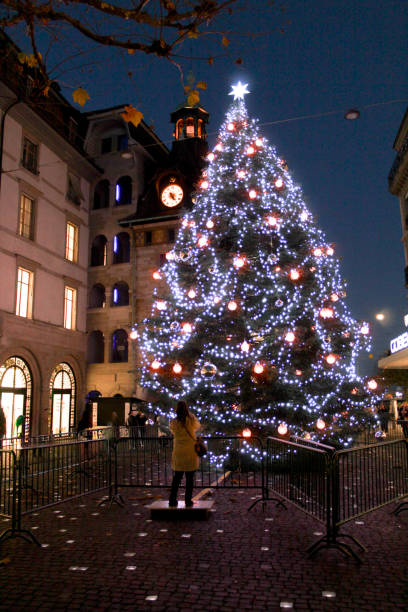 istock Woman in a Christmas tree 1761706845