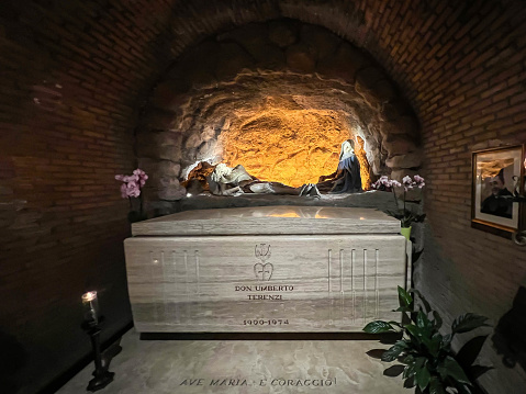 Rome, Italy, September 30, 2023: Tomb of priest Umberto Terenzi (very distinguished for the Sanctuary) in the crypt of the Sanctuary of the Madonna of Divine Love near Rome.