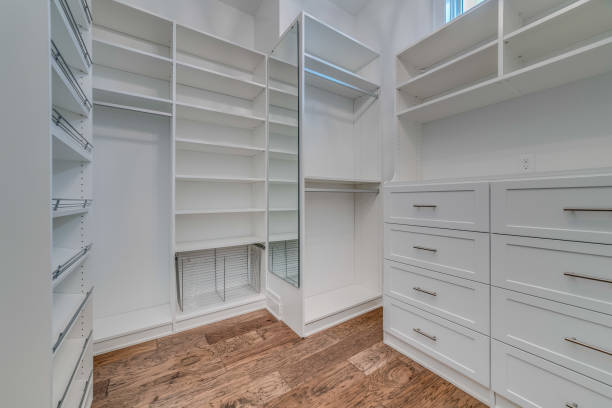 istock White drawers and shelves a plenty in large closet 1761734099