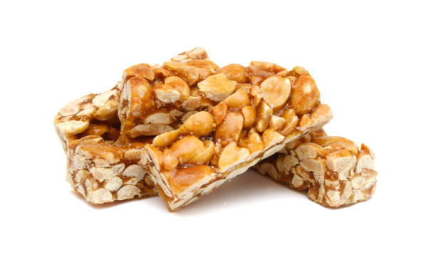 istock Honey bars with peanuts, sesame and sunflower seeds isolated 1761745854